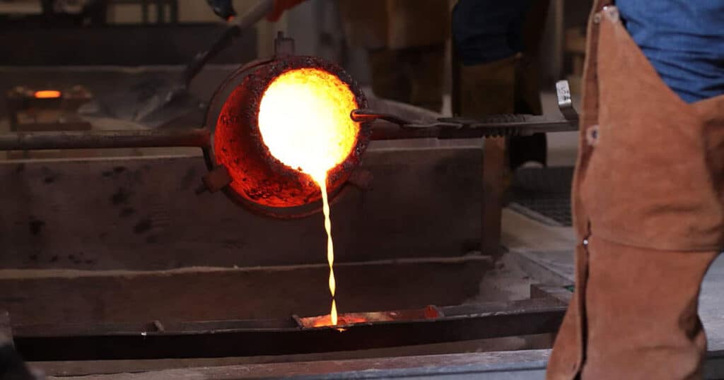 Hot metal is poured into a mold at the METAL Bootcamp.